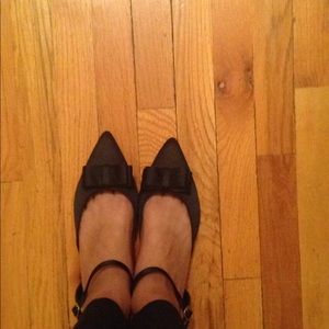 Color black, adjustable ankle straps.